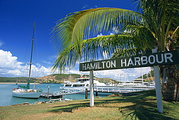 The sign and boats at Hamilton Harbour on Hamilton Island, Great Barrier Reef, Queensland, Australia, Pacific