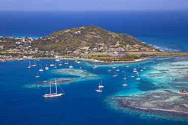 Aerial view of Union Island, looking towards Clifton and the airport, The Grenadines, St. Vincent and The Grenadines, West Indies, Caribbean, Central America