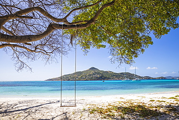 Looking across to Carriacou, Grenada, Petit St. Vincent, The Grenadines, St. Vincent and The Grenadines, West Indies, Caribbean, Central America