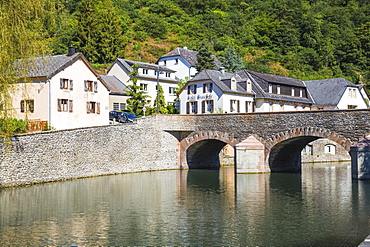 Stone bridge over Sure River, Esch-sur-Sure, Luxembourg, Europe