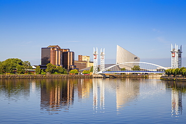 The Lowry footbridge and Imperial War Museum North, Salford Quays, Manchester, England, United Kingdom, Europe