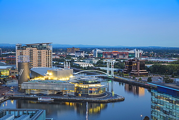 View of Salford Quays looking towards the Lowry Theatre and Old Trafford, Manchester, England, United Kingdom, Europe