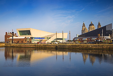 View of Pier Head buildings reflecting in Canning Dock, Liverpool, Merseyside, England, United Kingdom, Europe