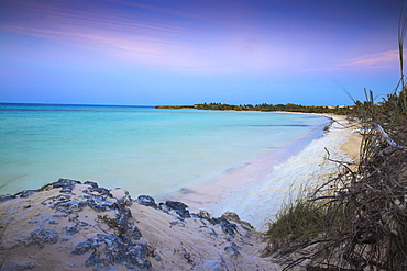 View of Playa Larga at sunset, Cayo Coco, Jardines del Rey, Ciego de Avila Province, Cuba, West Indies, Caribbean, Central America