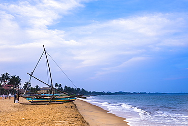 Traditional outrigger fishing boat (oruva), Negombo Beach, Negombo, Sri Lanka, Asia