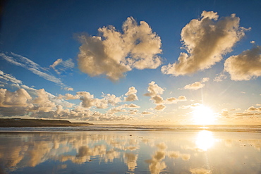 Cloud reflections at Constantine Bay at sunset, Cornwall, England, United Kingdom, Europe