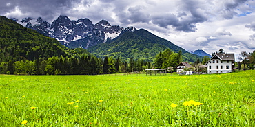 House below the Juilan Alps just outside Kranjska Gora, Triglav National Park, Upper Carniola, Slovenia, Europe