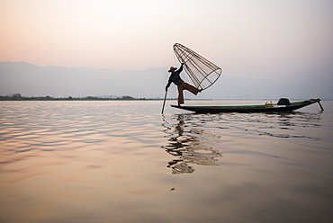 Inle Lake fisherman at sunrise (Intha fisherman), near Nyaungshwe, Shan State, Myanmar (Burma), Asia