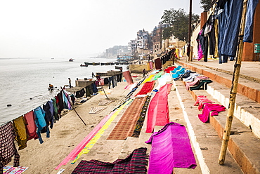 Washing drying on ghats next to the River Ganges, Varanasi, Uttar Pradesh, India, Asia