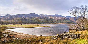 Llyn Dinas Lake in first sunlight, Snowdonia National Park, North Wales, United Kingdom, Europe