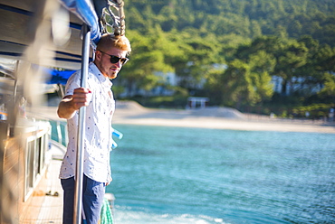 Tourist on Gulet sailing boat cruise, Kemer, Antalya Province, Lycia, Anatolia, Mediterranean Sea, Turkey, Asia Minor, Eurasia