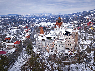 Bran Castle covered in snow in winter, Transylvania, Romania, Europe