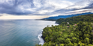 Drone view of Arco Beach and rainforest at sunrise, Uvita, Puntarenas Province, Pacific Coast of Costa Rica, Central America