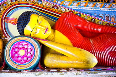 Colourful Buddha statue at Isurumuniya Vihara, Anuradhapura, UNESCO World Heritage Site, Sri Lanka,Asia