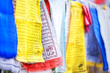 Prayer flags hung to carry people's prayers throughout the land of Bhutan, Asia