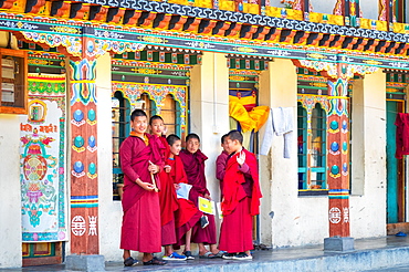 Novice monks in hillside monastery, Punakha, Bhutan, Asia