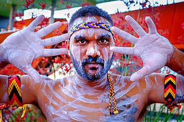 Portrait, Noongar Aboriginal dancers perform songs showcasing their culture in Yagan Square, Perth City, Western Australia, Australia, Pacific