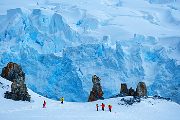 Hikers climbing Half Moon Island, South Shetland Islands, Antarctica, Polar Regions