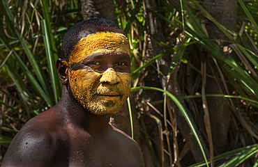 Aboriginal man, an artist with tribal clay paint used for Welcome to Country, at Nyinyikay Homeland, East Arnhem Land, Northern Territory, Australia, Pacific