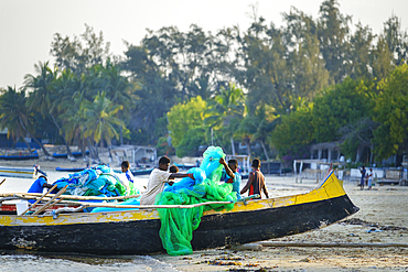 Malagasy fishermen preparing nets, Ifaty Beach, Tulear.