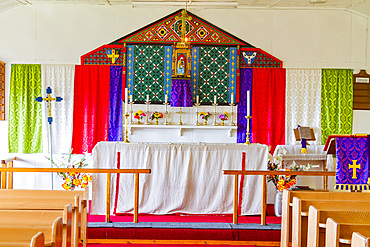 Brightly coloured altar inside a church on Tristan da Cunha, the most remote inhabited location on Earth, Tristan da Cunha, South Atlantic Ocean