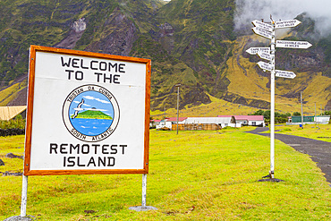 View of Welcome sign and signpost on Tristan da Cunha, the most remote inhabited location on Earth, Tristan da Cunha, South Atlantic Ocean