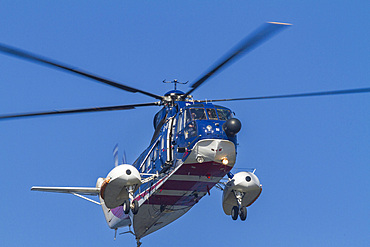 Helicopter bringing guests to New Island in the Falkland Islands, South Atlantic Ocean, South America