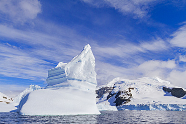 Iceberg in Lemaire Channel on the western side of the Antarctic Peninsula during the summer months, Southern Ocean.