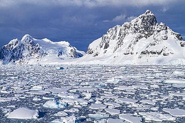 Brash ice chokes the Lemaire Channel on the west side of the Antarctic peninsula in Antarctica.