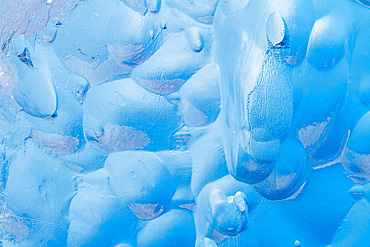 Glacial iceberg detail from ice calved off the Sawyer Glacier in Tracy Arm, Southeast Alaska, USA, Pacific Ocean.