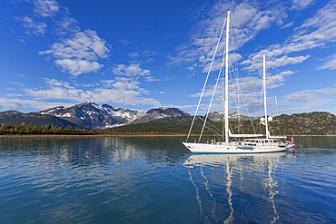 A view of various ships (shown here is the private yacht Timoneer) in Southeast Alaska, USA, Pacific Ocean.