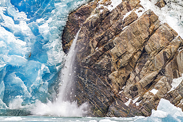 Sawyer Glacier calving from Tracy Arm - Fords Terror Wilderness area in Southeast Alaska, USA, Pacific Ocean.