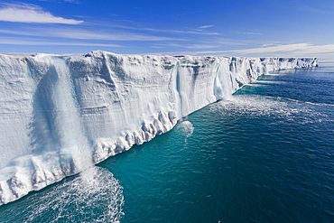 Freshwater melt forming waterfalls in Austfonna, an ice cap located on Nordaustlandet in the Svalbard archipelago in Norway.