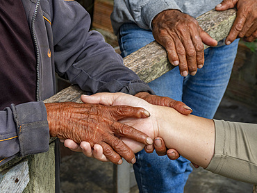Guests meeting a local in the village of Amazonas, Peru.
