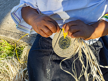 Demonstration of basket weaving made by the women from the NGO Minga Peru in the village of Amazonas, Peru.