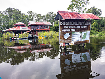 Local preserve signage in a national park deep within the Pacaya Samiria Preserve, Peru.