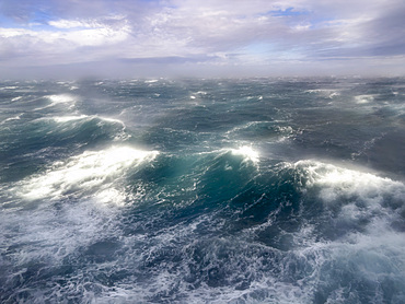 Gale force winds buffet the National Geographic Resolution in Tanaga Bay, Tanaga Island, Aleutian Islands, Alaska.