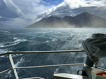 Gale force winds buffet the National Geographic Resolution in Tanaga Bay, Tanaga Island, Aleutian Islands, Alaska.