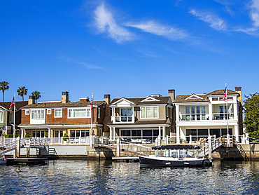 Multi million dollar homes long the water in the Newport Beach, California, USA.