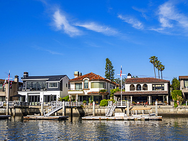 Multi million dollar homes long the water in the Newport Beach, California, USA.