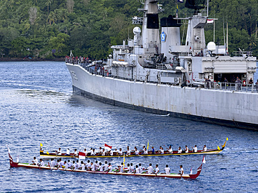 Groups of rowers coming out to greet our ship in the island of Banda Neira, Moluccas, Indonesia.
