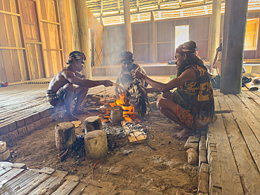 Traditional chicken meal being prepared in Waingapu, the largest town in the eastern half of Sumba Island, Indonesia