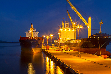 Night view of ships tied to the dock in Ushuaia, the capital of the Argentine province of Tierra del Fuego, Argentina.