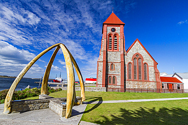 Blue whale mandibles frame the Anglican Christ Church Cathedral in Stanley, Falkland Islands, South Atlantic Ocean.