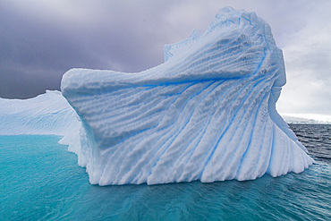 Iceberg detail showing the color blue around the Antarctic Peninsula, during the Austral summer months, Antarctica.
