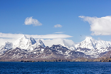 View of snow-capped mountains on approach to Stromness Harbor, South Georgia, UK Overseas Protectorate, Polar Regions