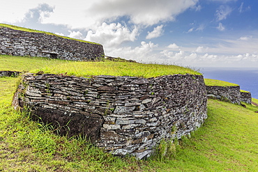 One of 53 stone masonry houses at Orongo, a stone village and Birdman ceremonial site at the southwestern tip of Easter Island, Rapa Nui National Park, UNESCO World Heritage Site, Easter Island (Isla de Pascua), Chile, South America