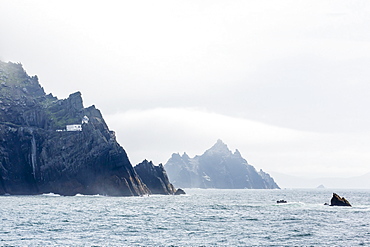 Fog shrouds the Skellig Islands, Great Skellig Michael in the foreground, Little Skellig behind, County Kerry, Munster, Irish Sea, Republic of Ireland, Europe