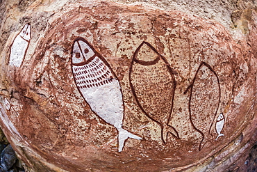 Aboriginal Wandjina cave artwork in sandstone caves at Raft Point, Kimberley, Western Australia, Australia, Pacific