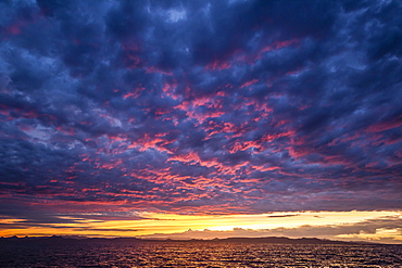 Intense clouds and sunset over Baja Peninsula from Isla Ildefonso, Baja California Sur, Mexico, North America